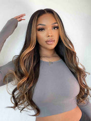 Model 2 front view wearing Angie HD lace wig – brown highlights and volume
