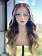 Selena chocolate brown wavy European hair wig with silver highlights, front view, HD lace,