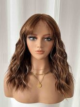 Front-side view of Date Night bob wig on mannequin with blonde highlights