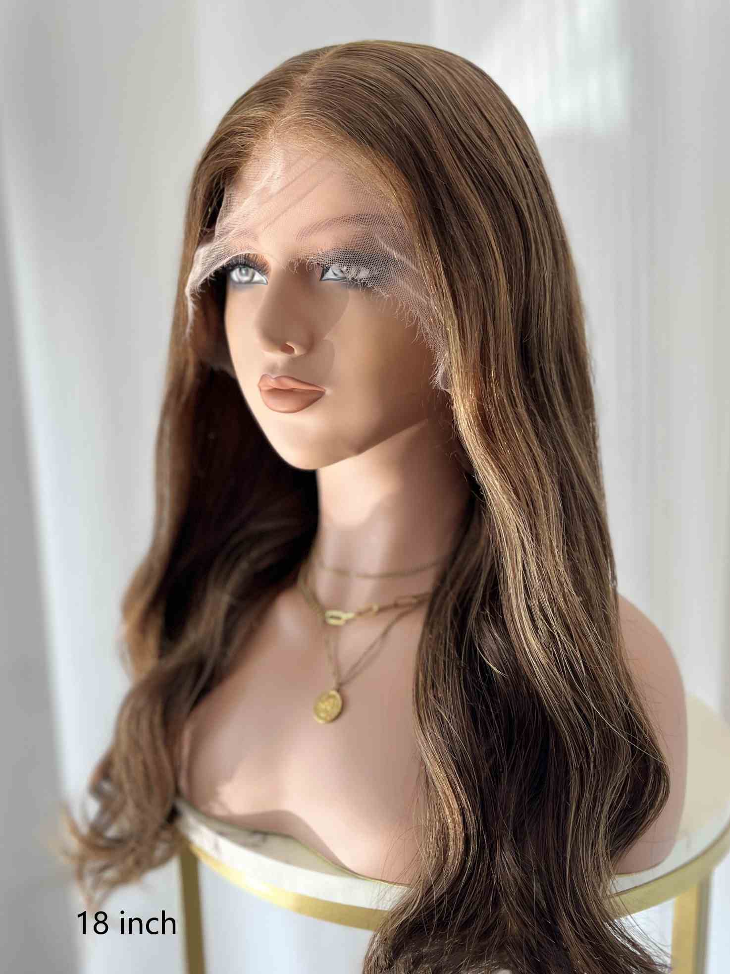 Side view of honey brown human hair wig with subtle golden highlights – left profile, HD lace wig