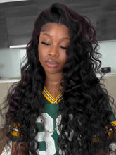 Model wearing Sunshine black natural wave human hair wig – front view