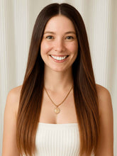 Model wearing Luna straight ombre brown wig with natural black roots – front view