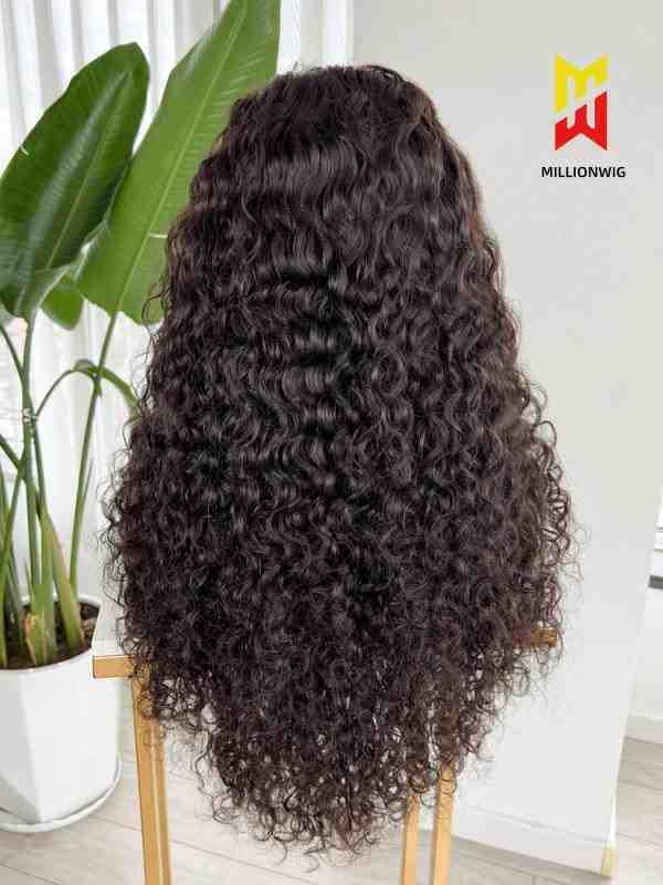 Back view of voluminous curly human hair wig – natural black color