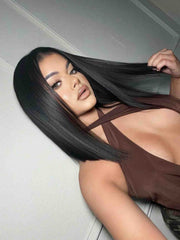 Model 1 side angle view wearing Alexis long bob wig – straight natural black