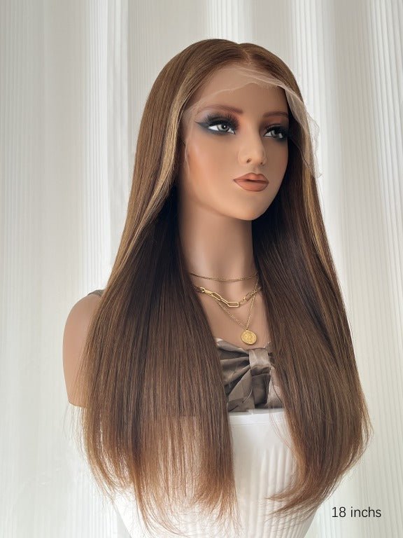 Left side view of brown straight wig with blonde front streaks