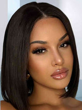 Model wearing Adah 10-inch bob wig – front view, sleek straight natural black