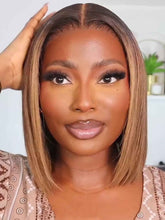 Front view of Kiera ombre bob wig with highlights on mannequin