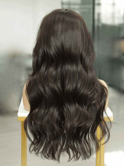 Back view of Missy wig with loose waves and natural shine