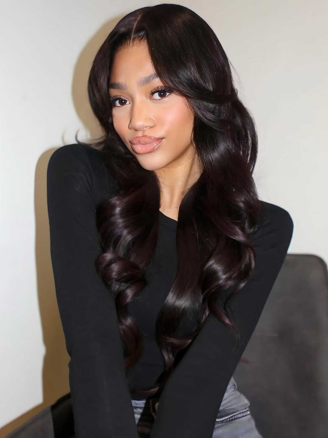 Model wearing Missy natural black human hair wig with bangs – front view