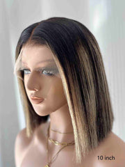 Left side view of Aubrie bob wig in brown blonde highlights on mannequin head