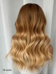 Mannequin wearing wig, back view under indoor lighting