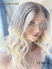 Aurora Blonde Short Wavy Wig 12 Inch – Right Side View on Mannequin in Sunlight | Ombre Blonde Waves