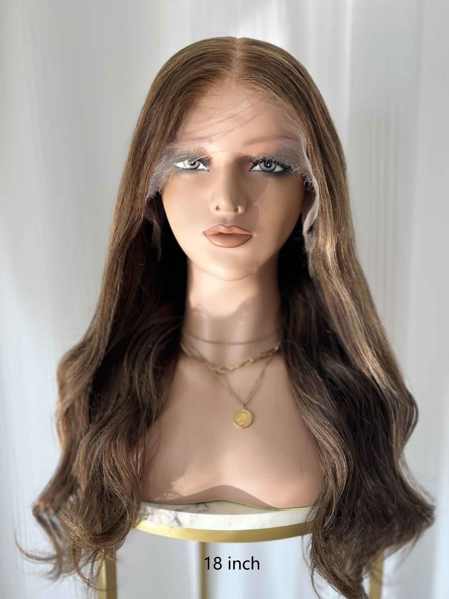 Honey brown wig with golden highlights on mannequin – front view, HD lace, 100% human hair