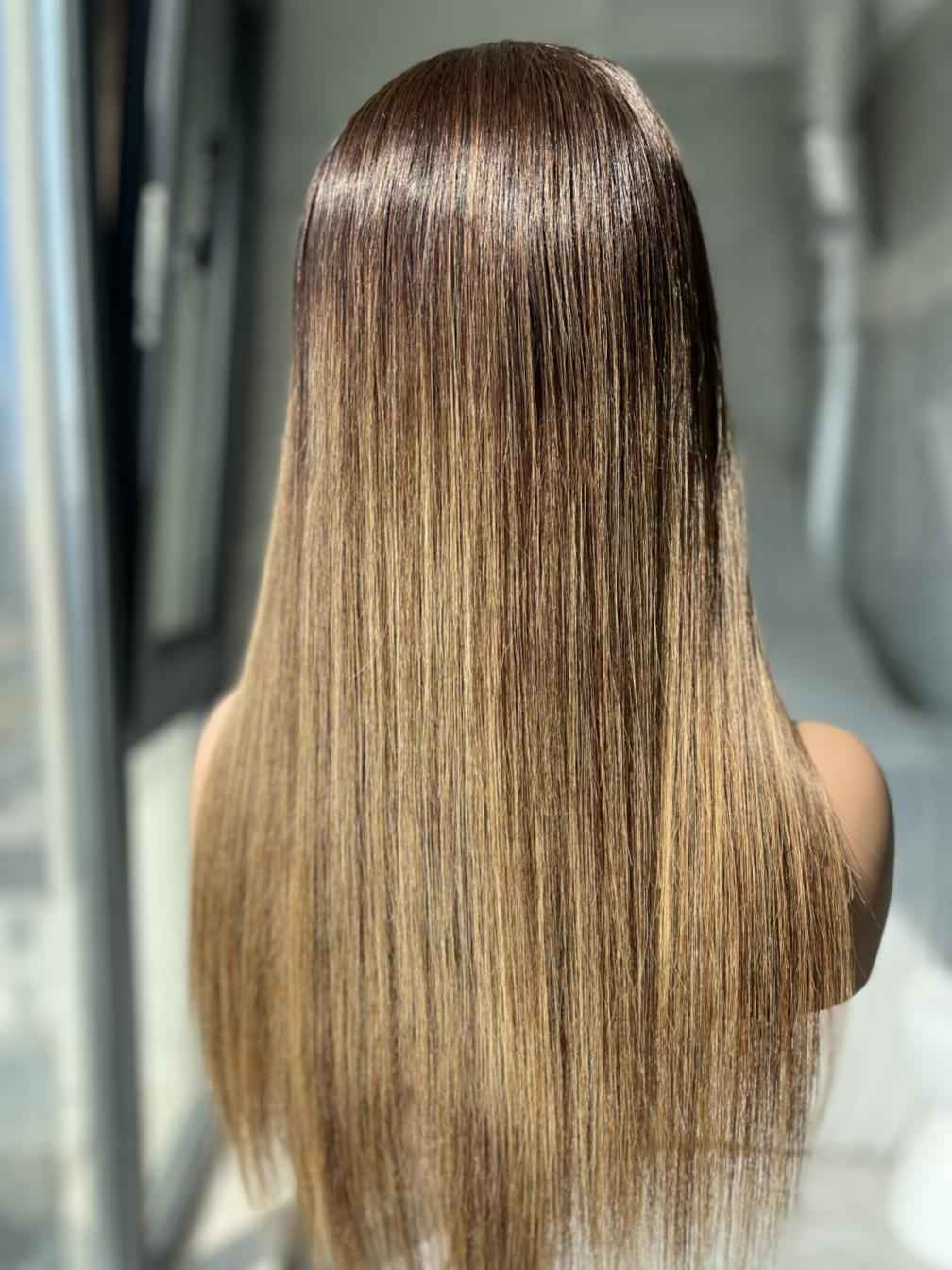 Amber straight human hair wig back view on mannequin